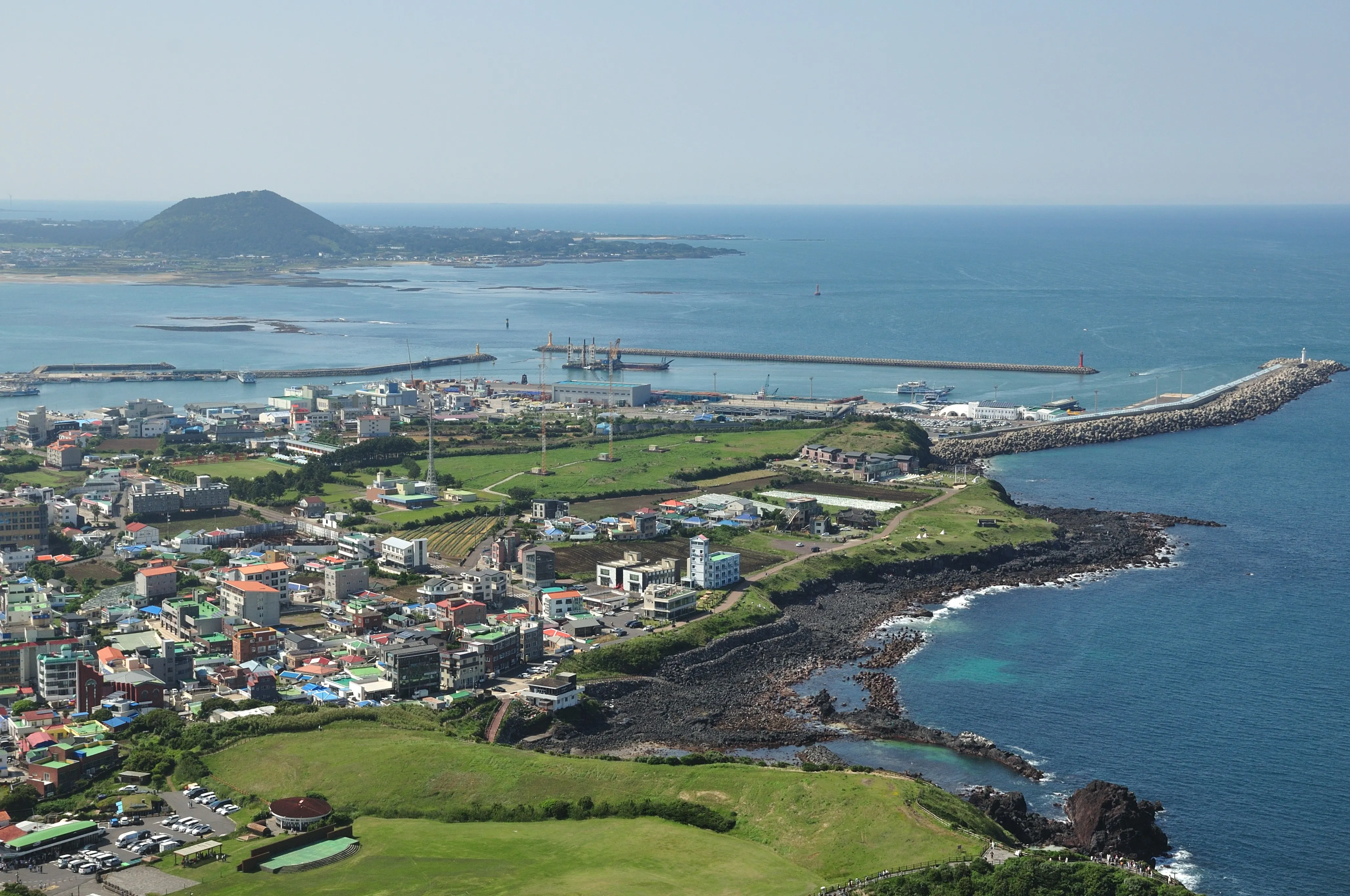 A coastal settlement and green landscape on Jeju