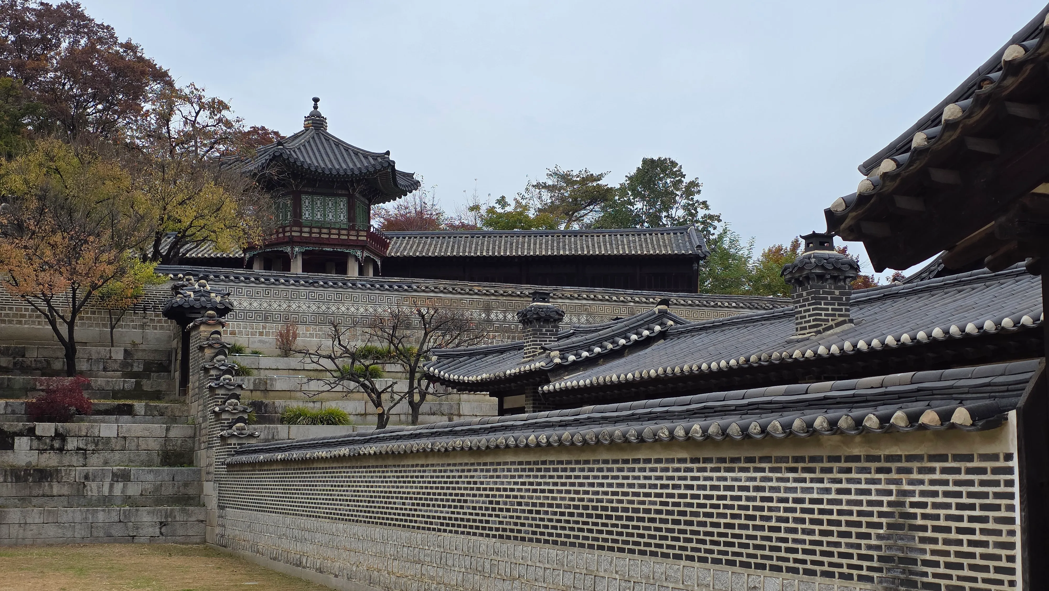 Traditional palace architecture and autumn foliage
